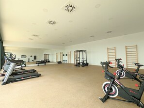 Wheel, Bicycle, Building, Exercise Machine, Stationary Bicycle, Floor, Flooring