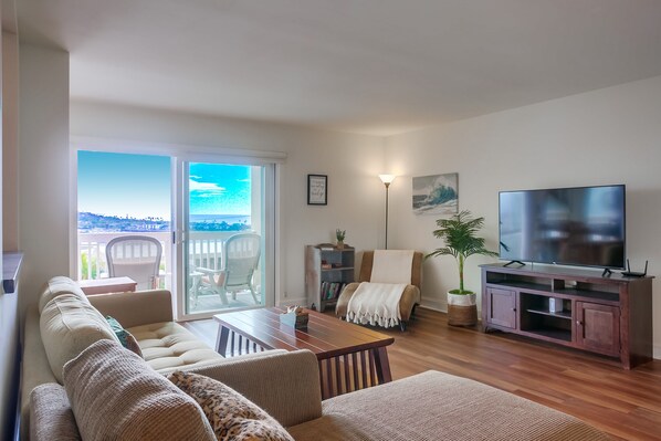 Cozy living room with views of the ocean.