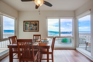 Dining for 4 people and a ceiling fan in the dining room.