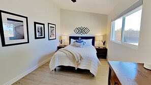 Bedroom 2 with Queen Bed, Ceiling Fan, and TV