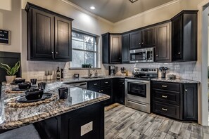 Fully stocked kitchen with all of the modern amenities