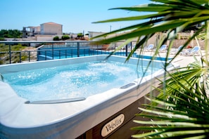 After a 'long day on holiday', soothe those tired muscles in the Jacuzzi!