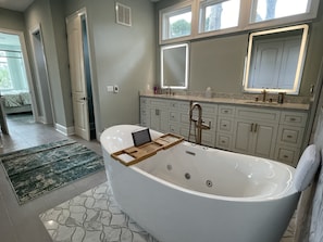 Ensuite Primary spa bath w/huge shower, whirlpool/air bubble tub & heated floors