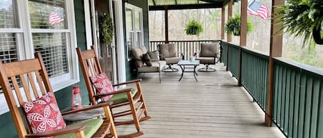Large, wrap around front porch with seating.