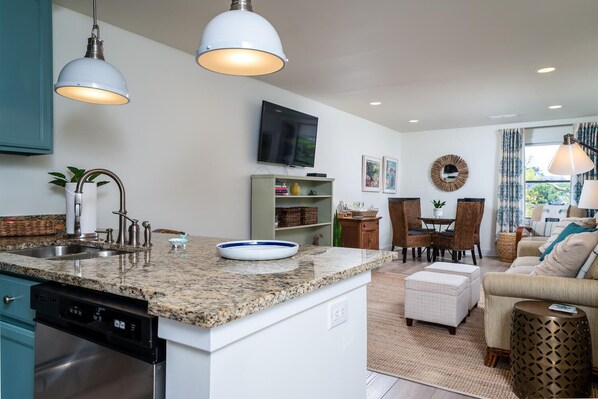 An inviting open concept combines the living, dining and kitchen areas.