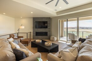 Large living room view - With a cozy upstairs living room, this is a perfect place to relax and watch TV.