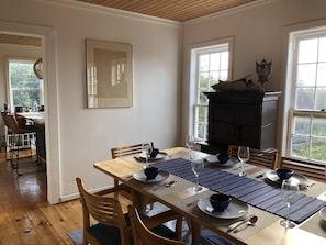 Dining room featuring dining table of Japanese elm designed by local craftsman.