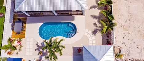 Aerial view of this 3 bed/2 bath private pool home.