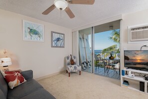 Living room opens to private lanai