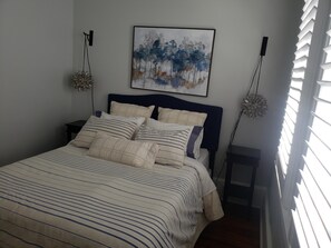 queen size bed in the second bedroom