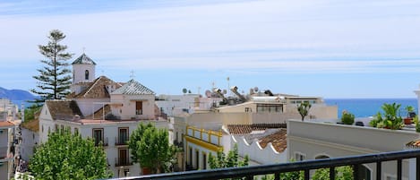 View from the lounge and bedroom windows towards the Balcon de Europa.