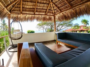 Tiki Hut (palapa) on top of the guest house