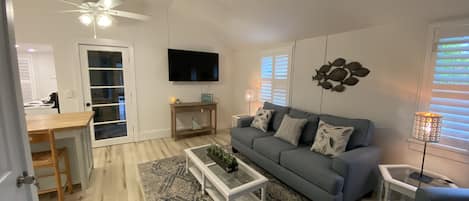 living room area/ceiling fans throughout home