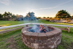 Oversized firepit for the whole family to gather and make delicious s’mores.