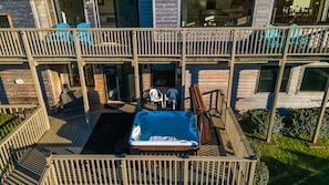 Your family will enjoy relaxing in the 6 person hot tub on the lower deck.