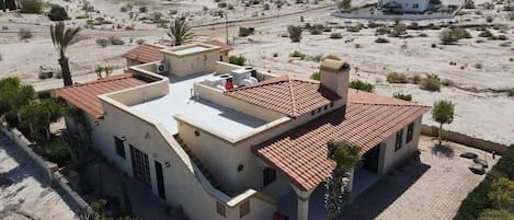 Casa Chun La ventana del mar vacation home-Aerial view fo the back of the home