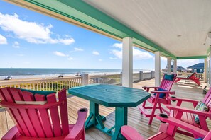 Take your meals out on the deck watching the waves crash onto the shore.