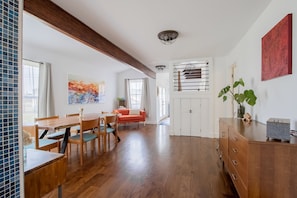 Spacious Dining area for laying out a feast, board game & playing records. 