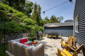 Grill & relax in our outdoor oasis. Big table, couch & ADK chairs for lounging