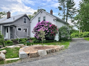 Back of the farmhouse. The white house is the guest house.