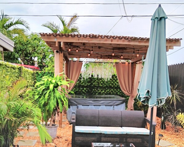 Patio seating/Jacuzzi-Spa area - No shared spaces/exclusive to guests.
