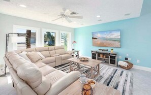 Living Room with Flat Screen TV and Reclining Chairs
