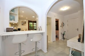 Breakfast bar for two guests near the kitchen