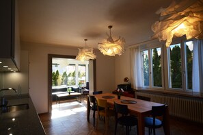 Large Kitchen diner, leading onto a lounge sunroom