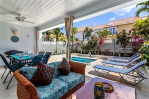 Enjoy a cocktail or curl up with a good book and enjoy the Barbados breeze