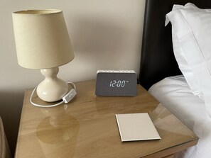 Alarm clock with wireless & USB phone charging