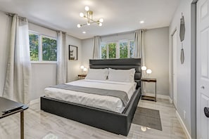 Master bedroom: king-sized bed provides a blend of comfort & space