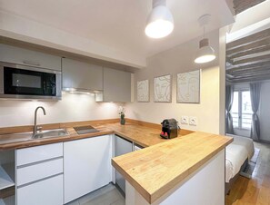 The kitchen has its own space.