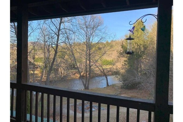 The view of the Toccoa River is right off the back porch