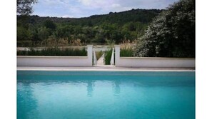 The pool looking out over the jetty and lake