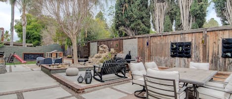 Backyard Oasis with ample seating to relax and unwind after a long day. 