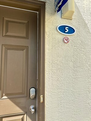 #5 entrance, 2 reserved parking spaces right beside the entry