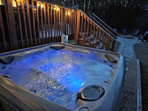 Nighttime view of the Hot Tub