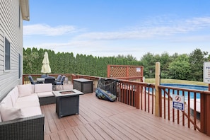 Large deck-outdoor furniture, propane fire pit, propane grill and heated pool. 