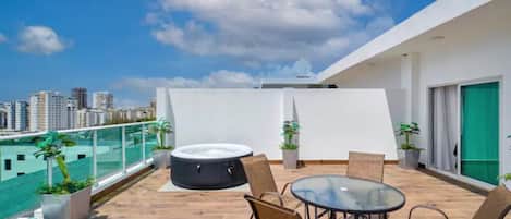 Spacious Private Terrace comes with a Lounge/Dining Area, BBQ, Jacuzzi & View.