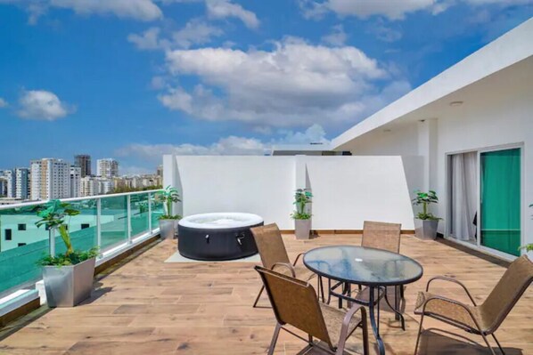Spacious Private Terrace comes with a Lounge/Dining Area, BBQ, Jacuzzi & View.