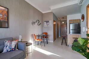The Comfortable fully equipped Living Room, Private Terrace, 55 Inch Smart TV.