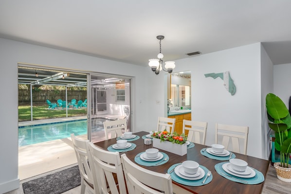 The dining room also has direct views of the swimming pool and back yard.