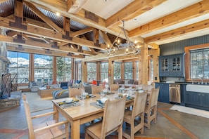 The open floor plan makes for excellent entertaining. Enjoy the views and fire place as well!