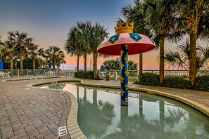 Family-friendly splash pad and playground