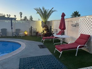 Pool chaise lounges.