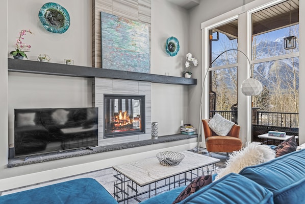 Cozy up and gather around the fireplace. Create memories together.
