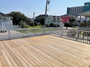 Large deck off of 2nd floor which has a partial ocean view off of