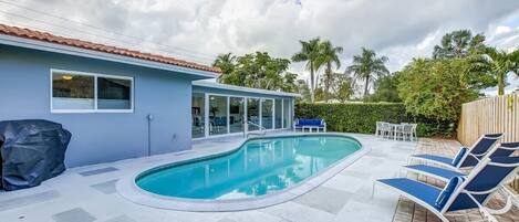 Private pool with outdoor seating & grill