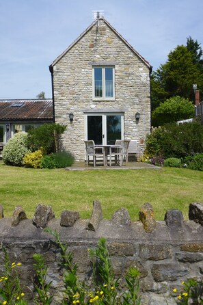 Enclosed shared garden with private terrace