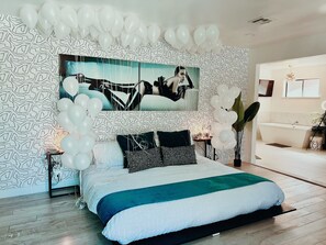 The primary bedroom with king size bed. 